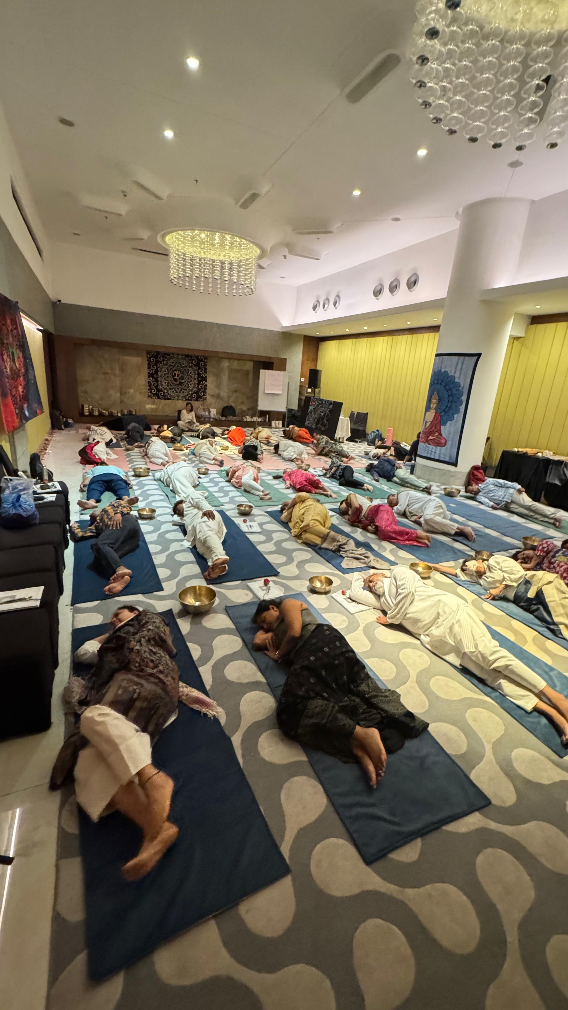Group sound healing — participants lying in rest