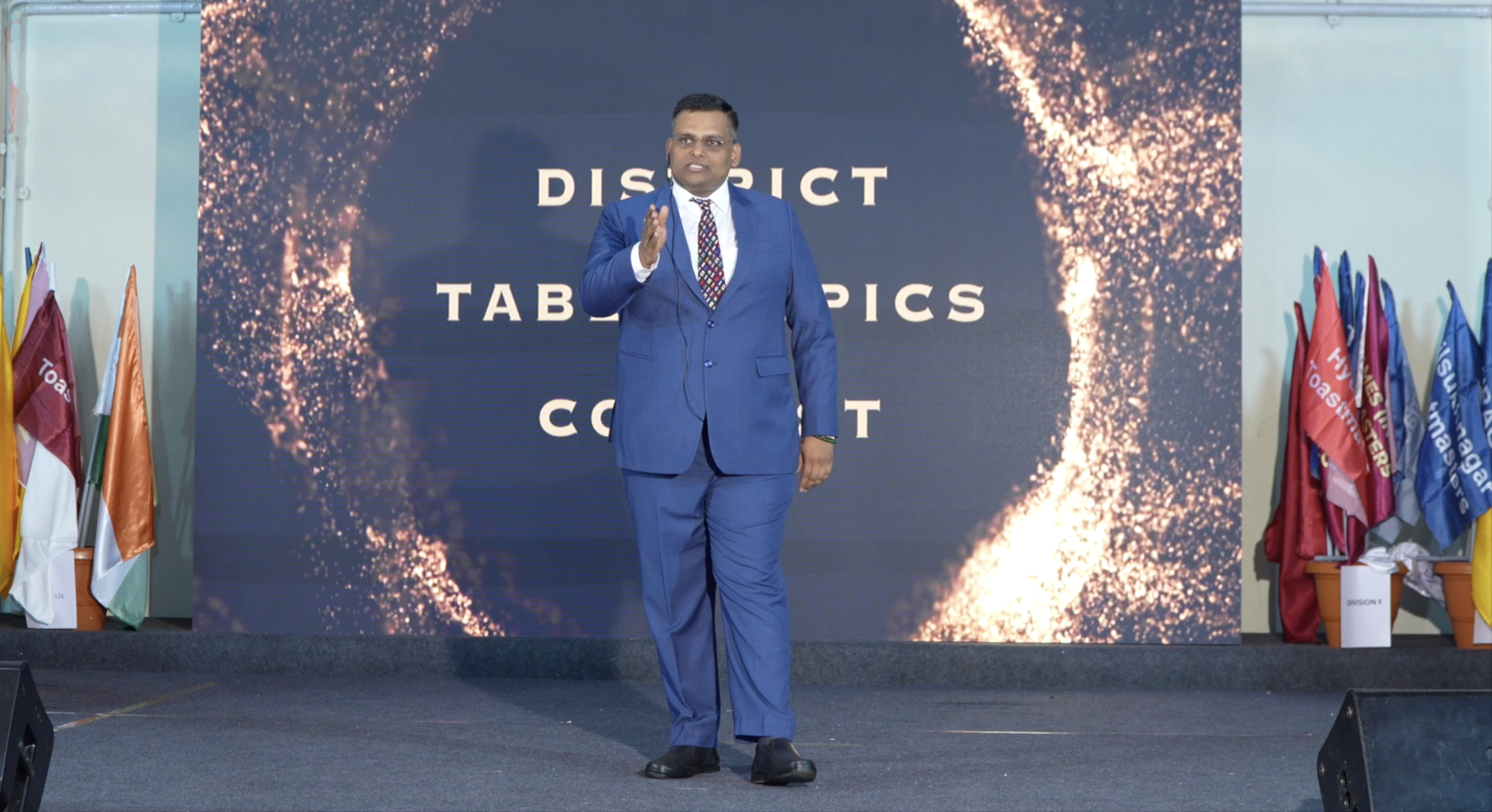 Full audience at Toastmasters District event — Harsh Singhal on stage
